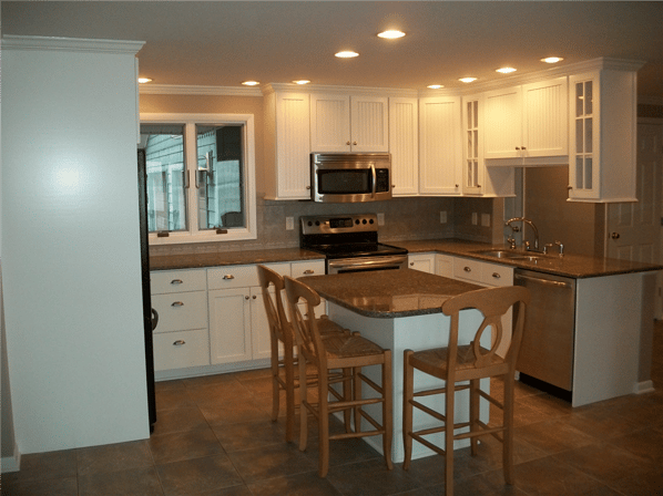 L-Shaped Kitchen Design With Ambient Lighting