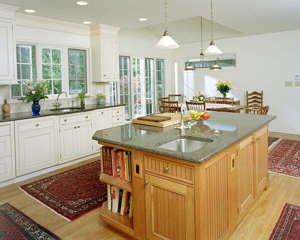 Kitchen island with cooktop store and sink