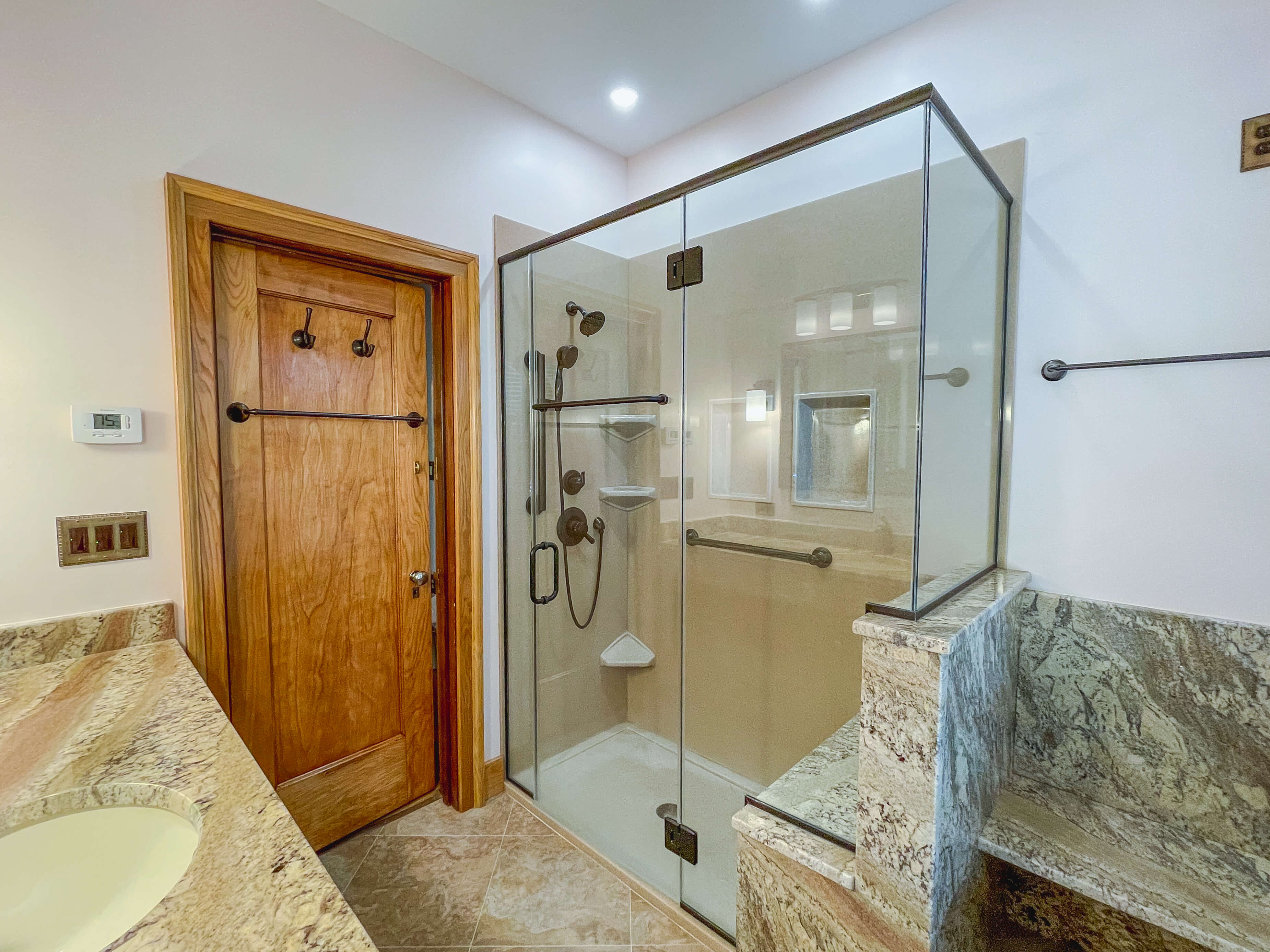 https://www.mcclurgteam.com/hs-fs/hubfs/walk-in-shower-bathroom-remodel-2.jpg?width=3702&height=2776&name=walk-in-shower-bathroom-remodel-2.jpg